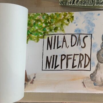 Ein illustriertes Nilpferd mit der Headline "Nila das Nilpferd"